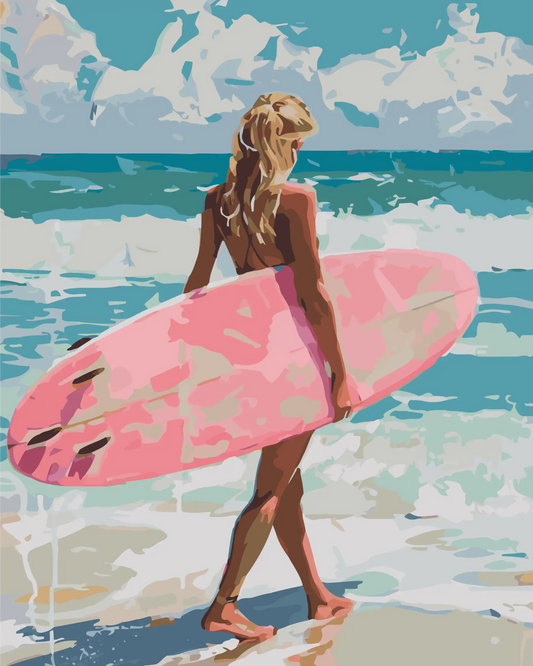 Woman holding a pink surfboard on a beach with ocean waves in the background