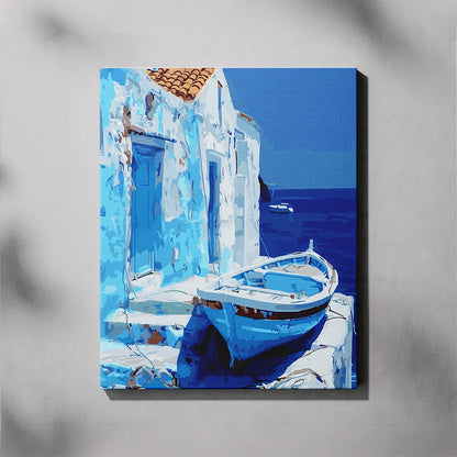 Canvas print of a blue boat against a white building with blue doors and windows, set against a clear blue sky.