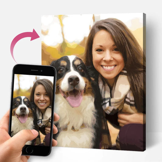 Person holding a phone with a photo of themselves and a dog, next to a canvas print of the same photo.