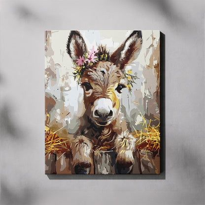 Cute Donkey paint by number kit — completed canvas mockup of a baby donkey with a pink floral crown peering over a rustic wooden fence with golden hay
