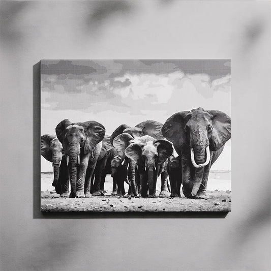 Canvas print of a black and white elephant family on a plain background