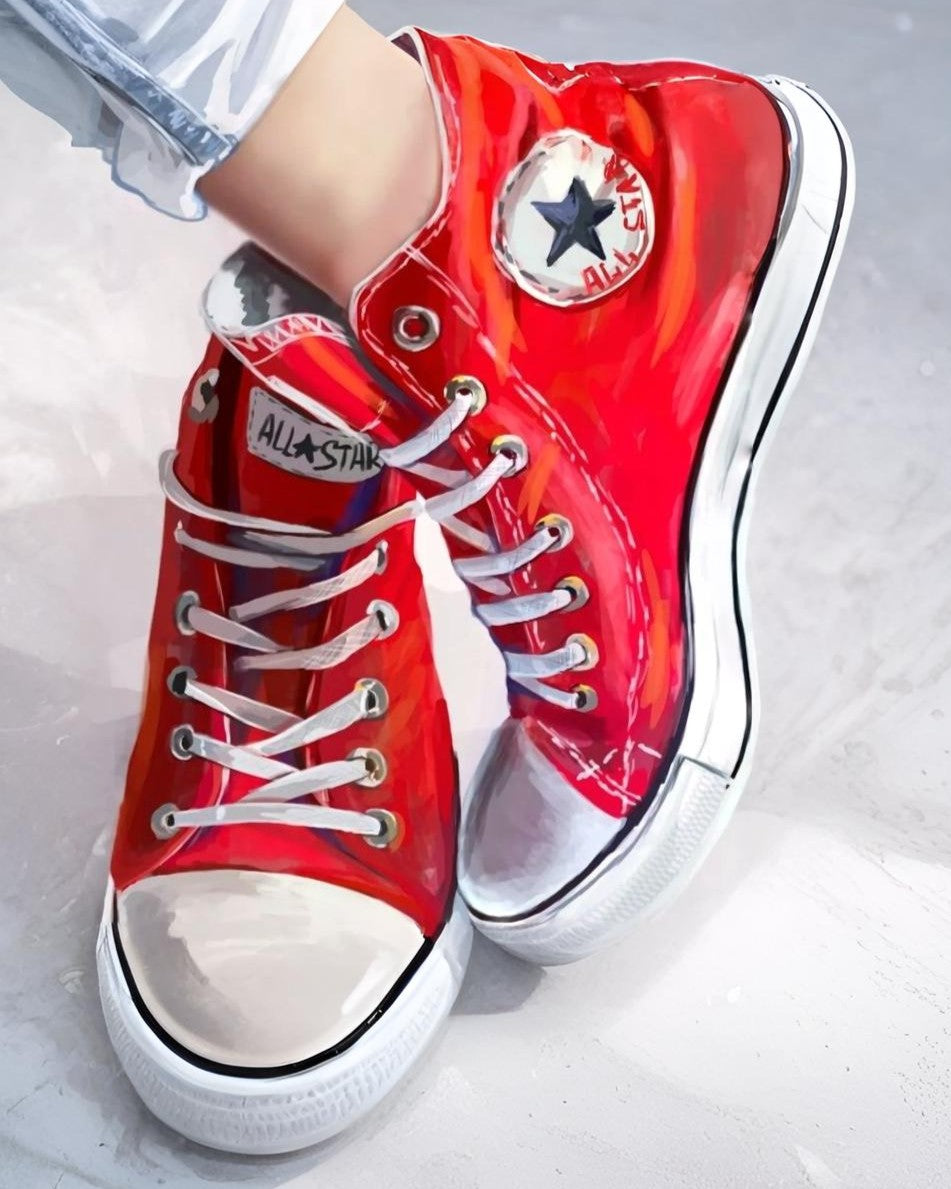 Red high-top sneakers with white soles on a light gray background