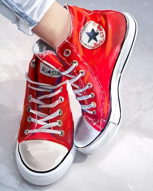 Red high-top sneakers with white soles on a light gray background
