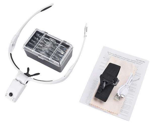 White headband with black clips on a white background