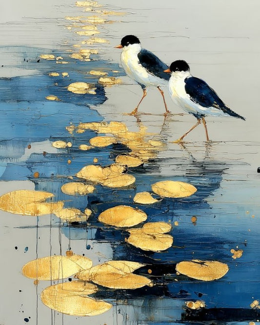 A stylized painting of two black-and-white birds standing in reflective blue water with scattered gold lily pads and gold paint drips.