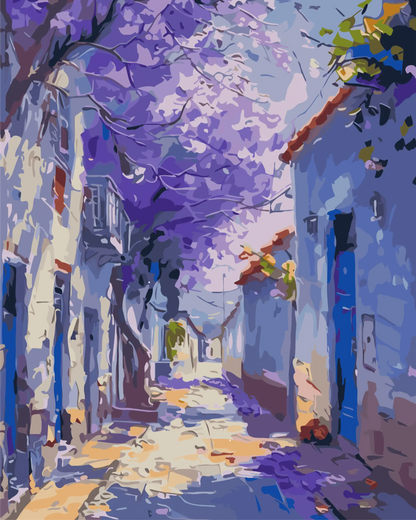 Colorful street scene with purple flowers and buildings