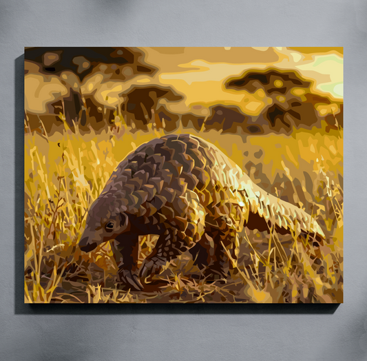 A paint by number canvas showing a pangolin walking through golden grass at sunset, mounted against a gray wall.