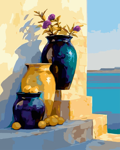 Sunlit Jars paint by number kit — artistic effect of three ceramic jars on stone steps in deep navy, warm gold and bright teal tones with the Mediterranean sea in the background