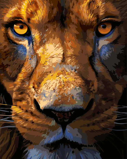 A close-up paint by number of a lion's face with vivid orange-yellow eyes, golden-brown fur, and dark shadowed areas against a black background.