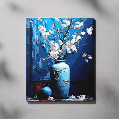 Painting of a blue vase with white flowers on a gray background