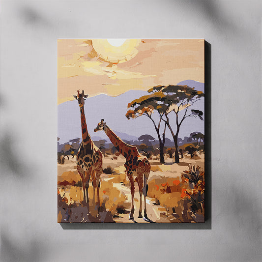 Bush Stroll paint by number kit — completed canvas mockup of two giraffes in golden bushveld with acacia trees, blue mountains and a glowing sun