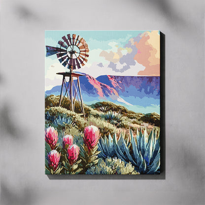 Canvas print of a colorful landscape with a windmill and pink flowers on a gray background