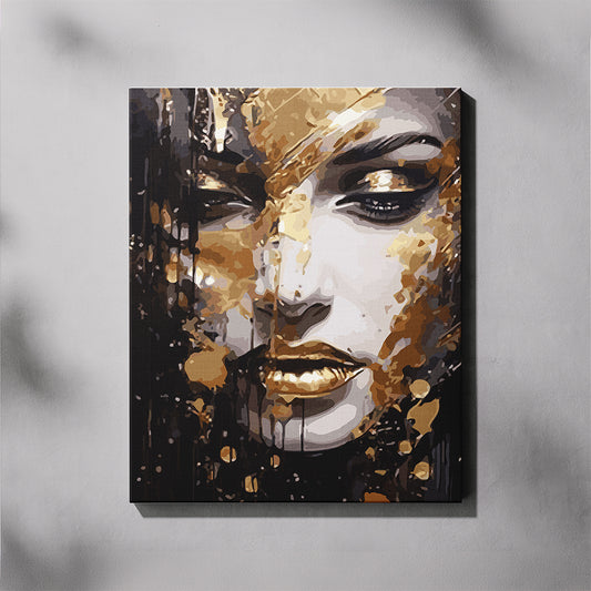 Abstract art painting of a face with gold and black accents on a gray background