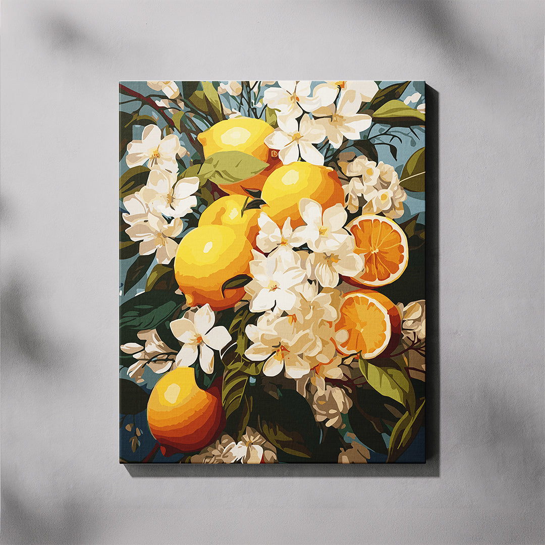 Canvas print of lemons, oranges, and white flowers on a dark background