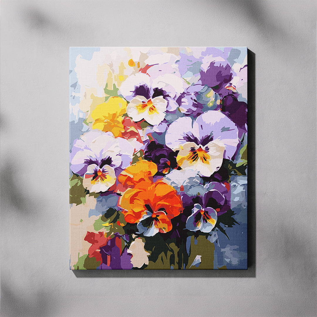 Canvas print of colorful pansy flowers on a gray background