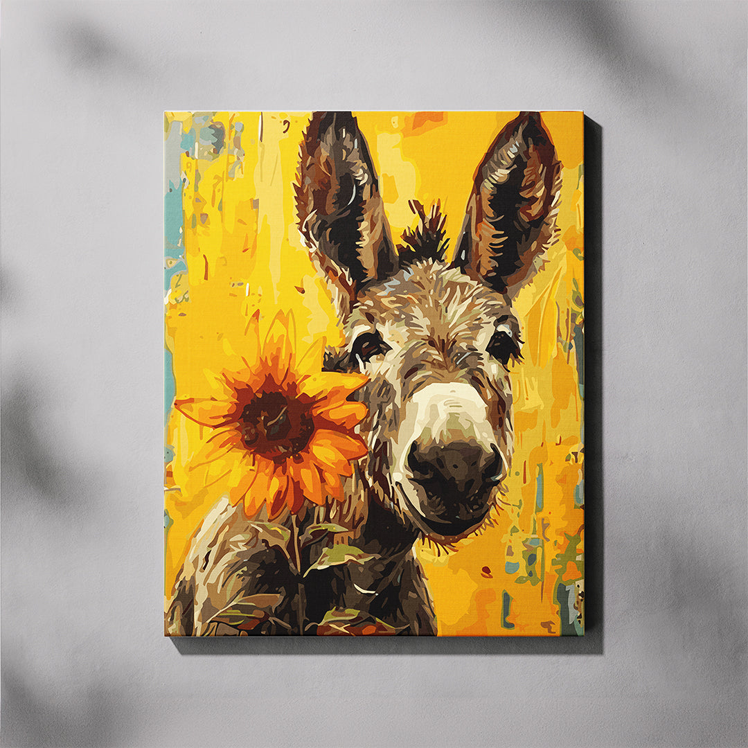 Canvas print of a donkey and sunflower on a yellow background