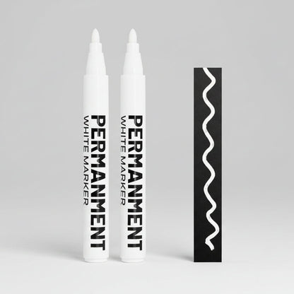 Two white markers with 'PERMANEN' branding on a white background