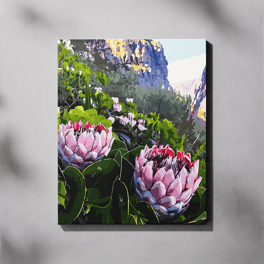 Canvas print of pink protea flowers with a mountainous background